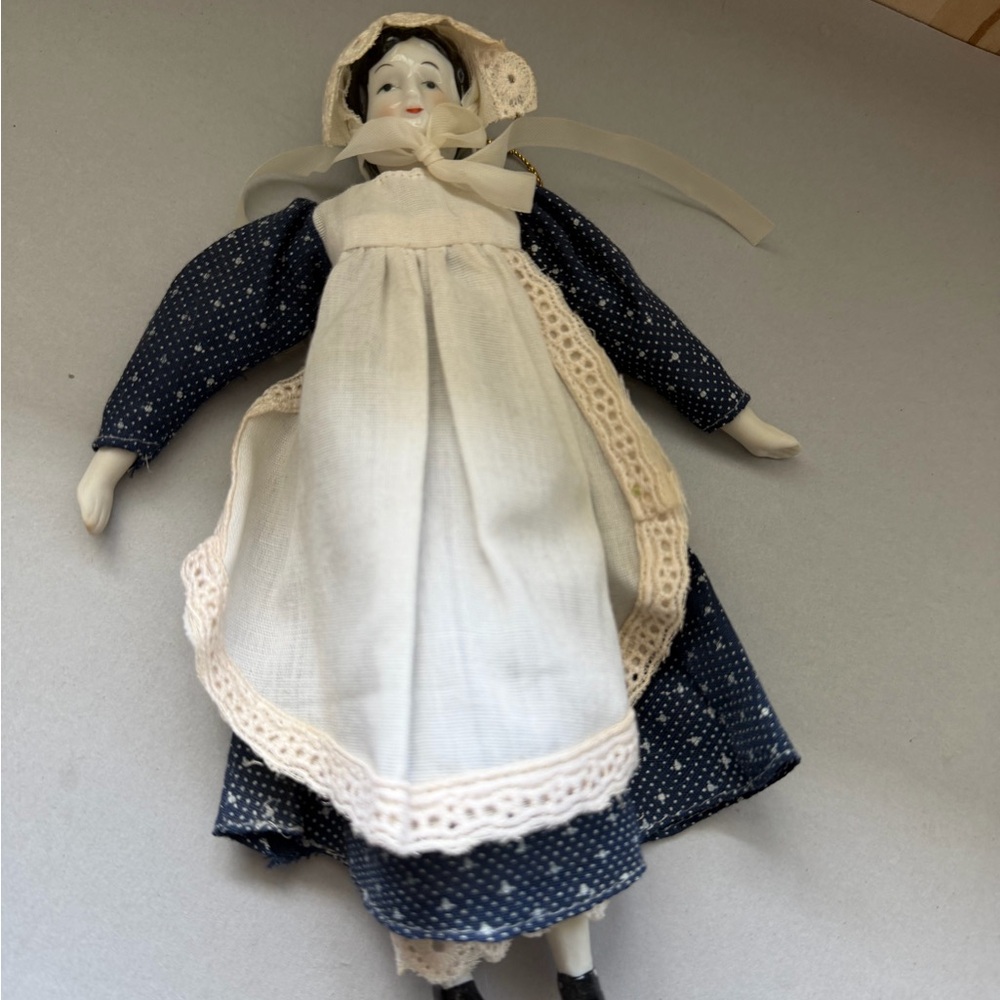 Antique Porcelain Doll Ornament with Blue Dress and White Apron